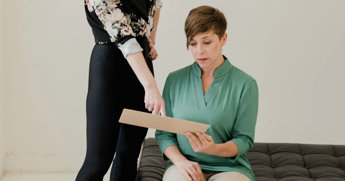 Business mentor advising a client